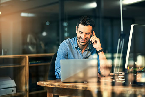A man taking a business call