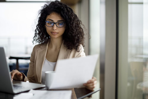 A woman working on a laptop