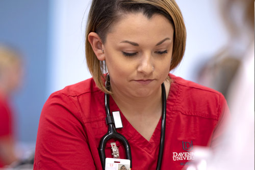 A nursing student with a stethoscope