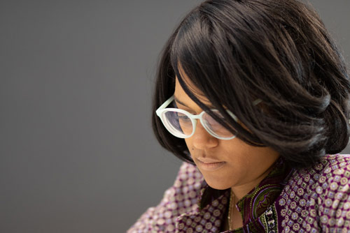 a woman concentrating on a task